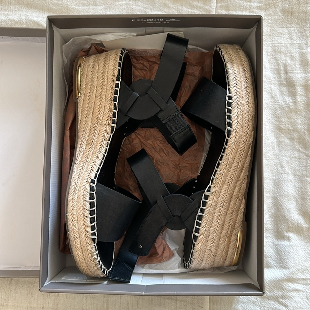 Women’s black and woven wedges